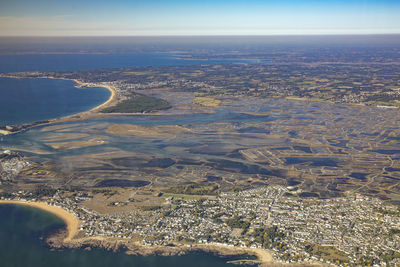 Aerial view of city against sky