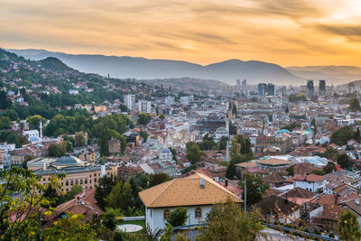 High angle view of townscape against sky during sunset