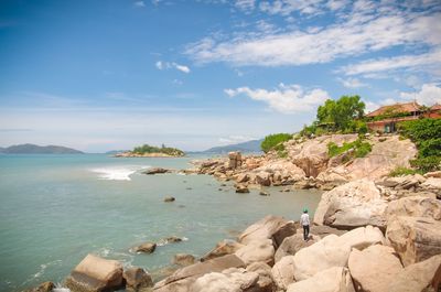Scenic view of sea against cloudy sky