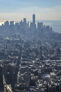 Aerial view of cityscape against sky