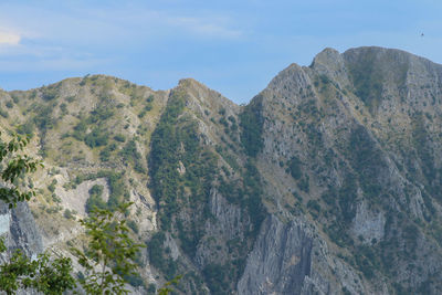 Panoramic view of rocky mountains against sky