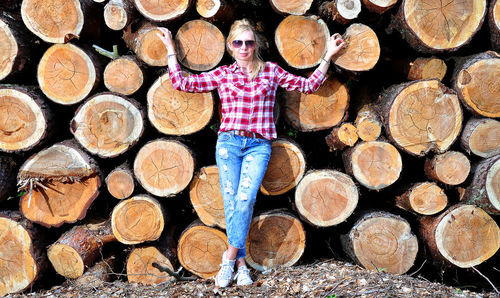Stack of logs in forest