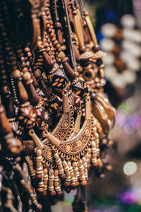 Close-up of necklaces for sale in market