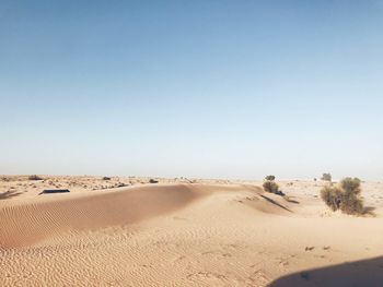 Scenic view of desert against clear sky