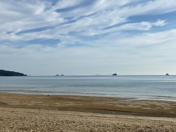 Scenic view of beach against sky