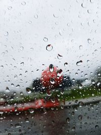 Close-up of water drops on car windshield