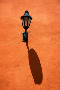 Close-up of lamp on wall