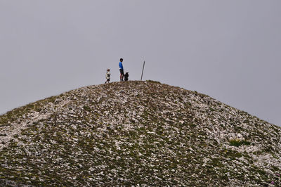 People walking on slope