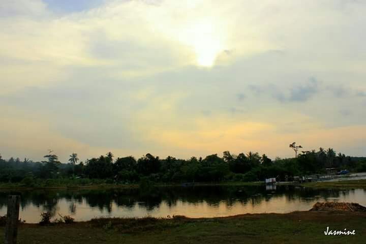 water, sunset, tranquil scene, sky, lake, tranquility, scenics, tree, beauty in nature, cloud - sky, nature, reflection, idyllic, silhouette, river, cloud, non-urban scene, cloudy, outdoors, lakeshore