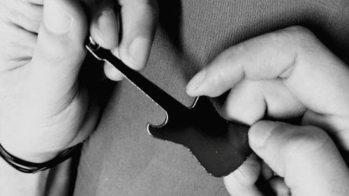Close-up of baby holding hands