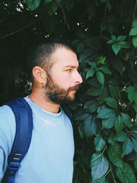 Young man looking away outdoors
