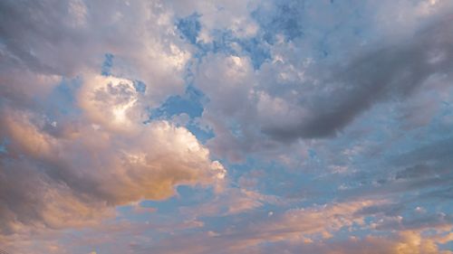 Low angle view of clouds in sky during sunset