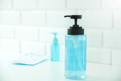 Close-up of water bottle on table