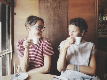 Young woman with coffee cup