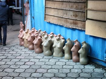 Mannequins on footpath for sale