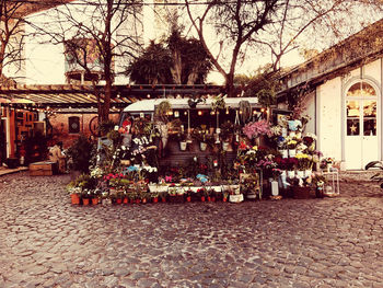 Street market against buildings in city