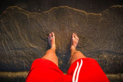 Low section of man on rock