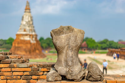 View of temple against building