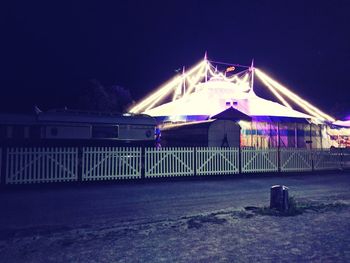 View of illuminated bridge at night