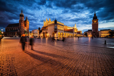 Illuminated buildings in city at night