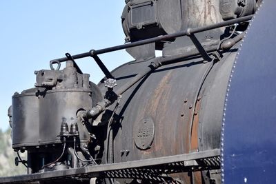 Low angle view of train against sky