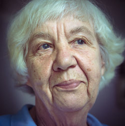 Close-up of thoughtful senior woman looking away