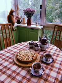 Tea cup on table at home