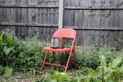 Red chair against wall