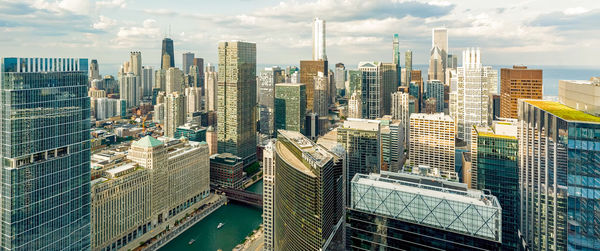 Modern buildings in city against sky