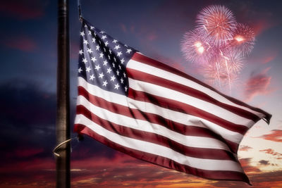 Low angle view of flag against sky