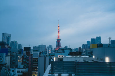 Modern buildings in city against sky