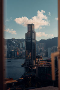 Modern buildings in city against sky
