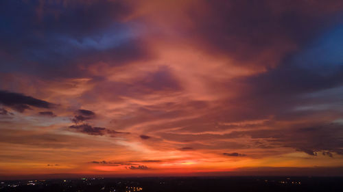Low angle view of dramatic sky during sunset
