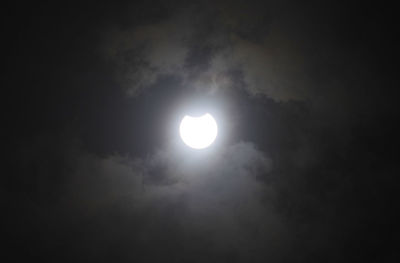 Low angle view of moon against sky at night