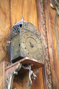 Close-up of clock on wood