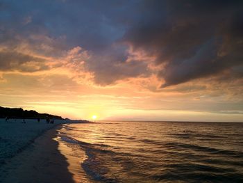 Scenic view of beach during sunset