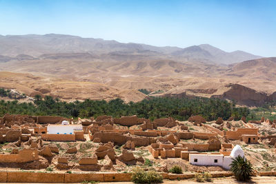 Scenic view of residential district against sky