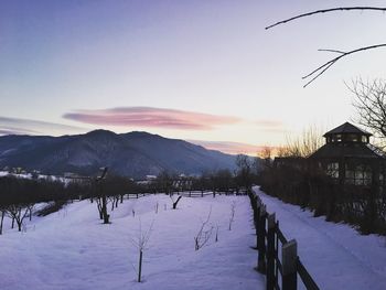 Scenic view of landscape against sky during winter
