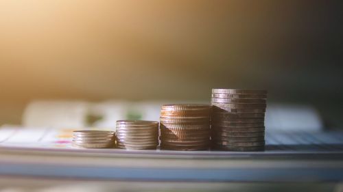 Close-up of coins on table