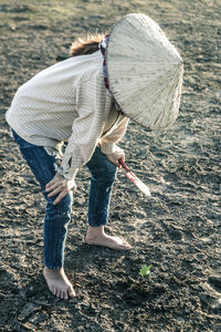 Full length of man working on field