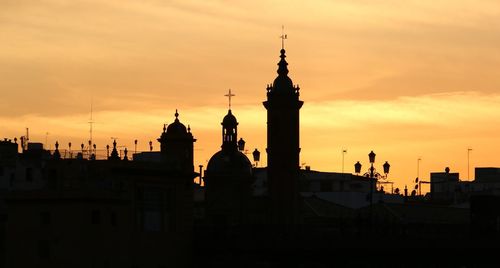 Capilla virgen del carmen against sky during sunset in city