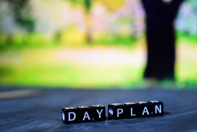 Close-up of information sign on road