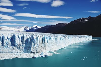 Scenic view of frozen sea against sky