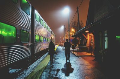 Woman walking on subway platform