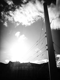 Low angle view of building against cloudy sky
