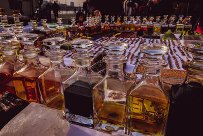 Close-up of wine bottles on table