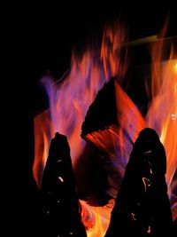 Close-up of bonfire against fire at night