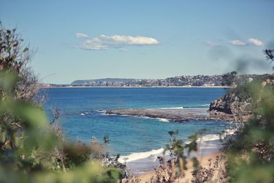 Panoramic view of sea and bay against sky