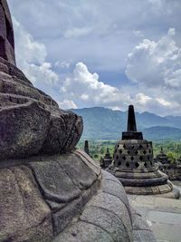 View of temple against cloudy sky