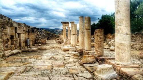Old building against cloudy sky
